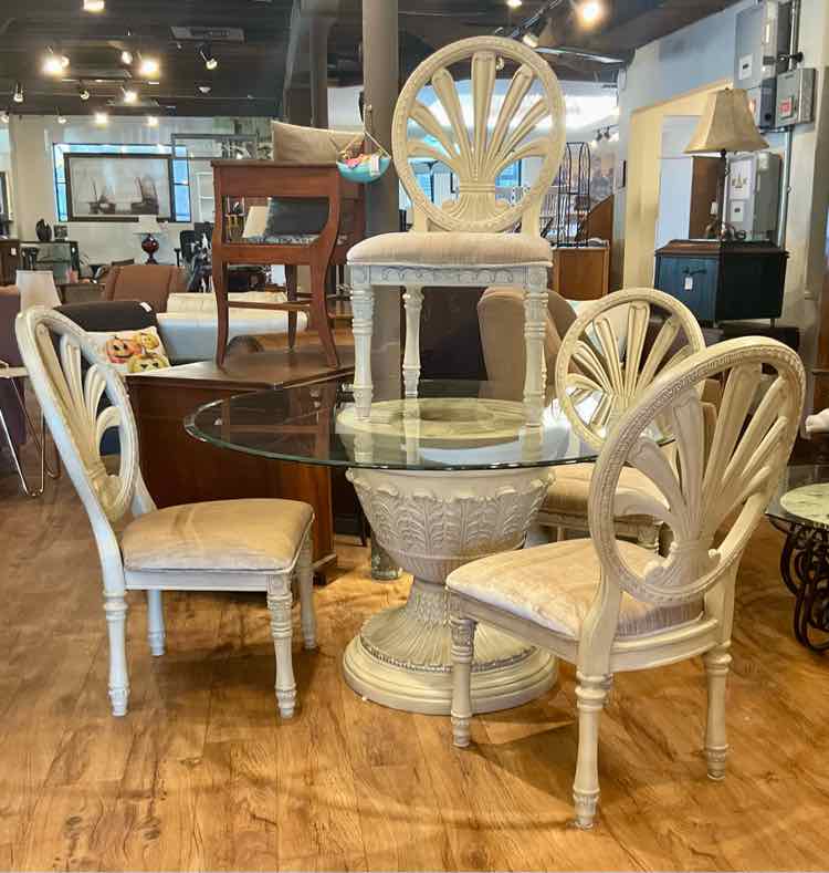 Ortanique by Ashley Pedestal Dining Table w/ 4 Chairs